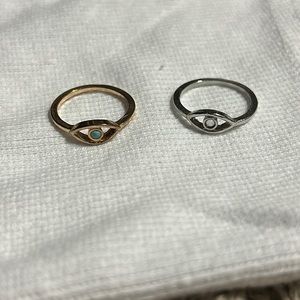 silver and gold evil eye rings